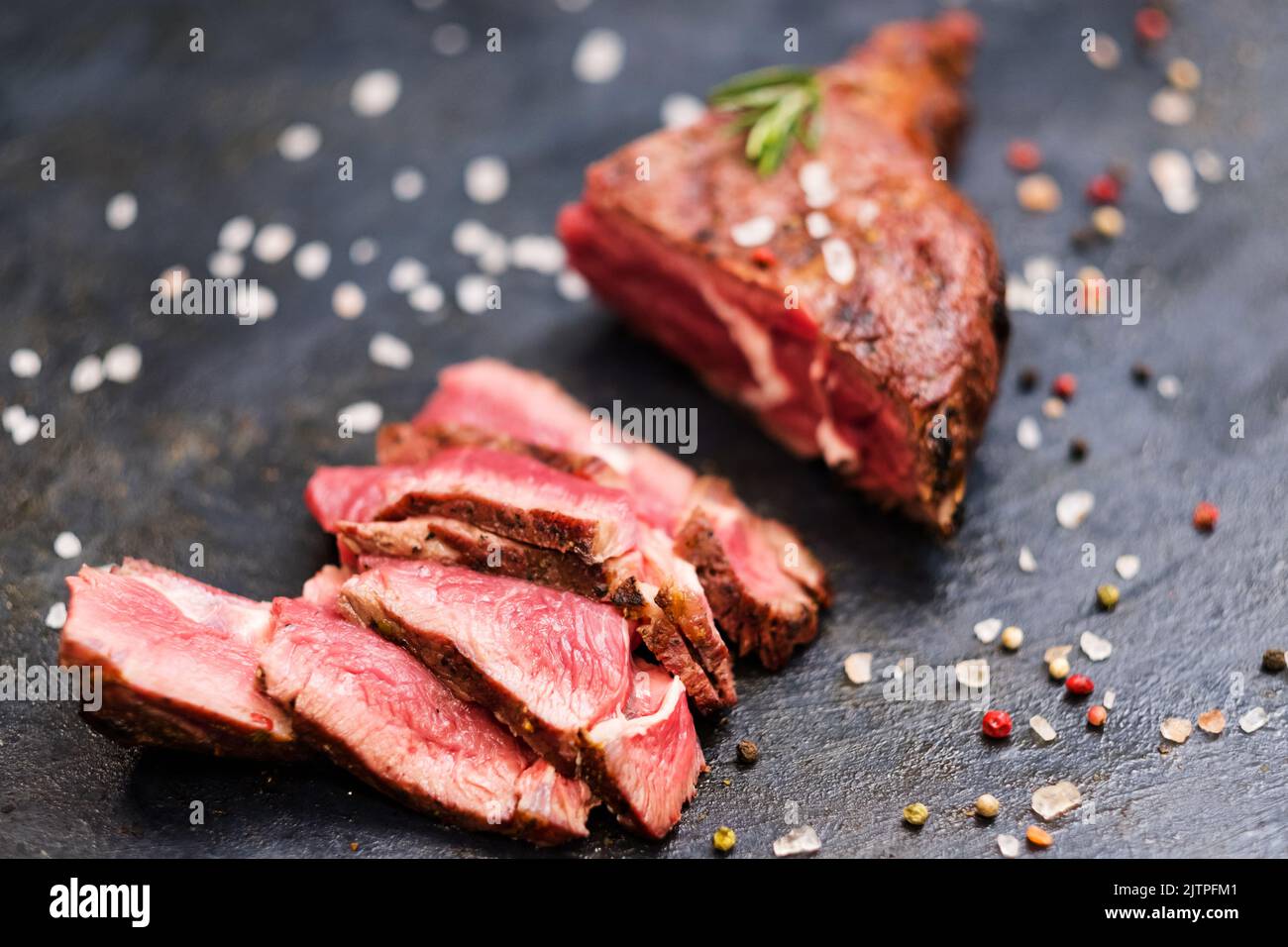 food delivery service cowboy steak sliced beef Stock Photo Alamy