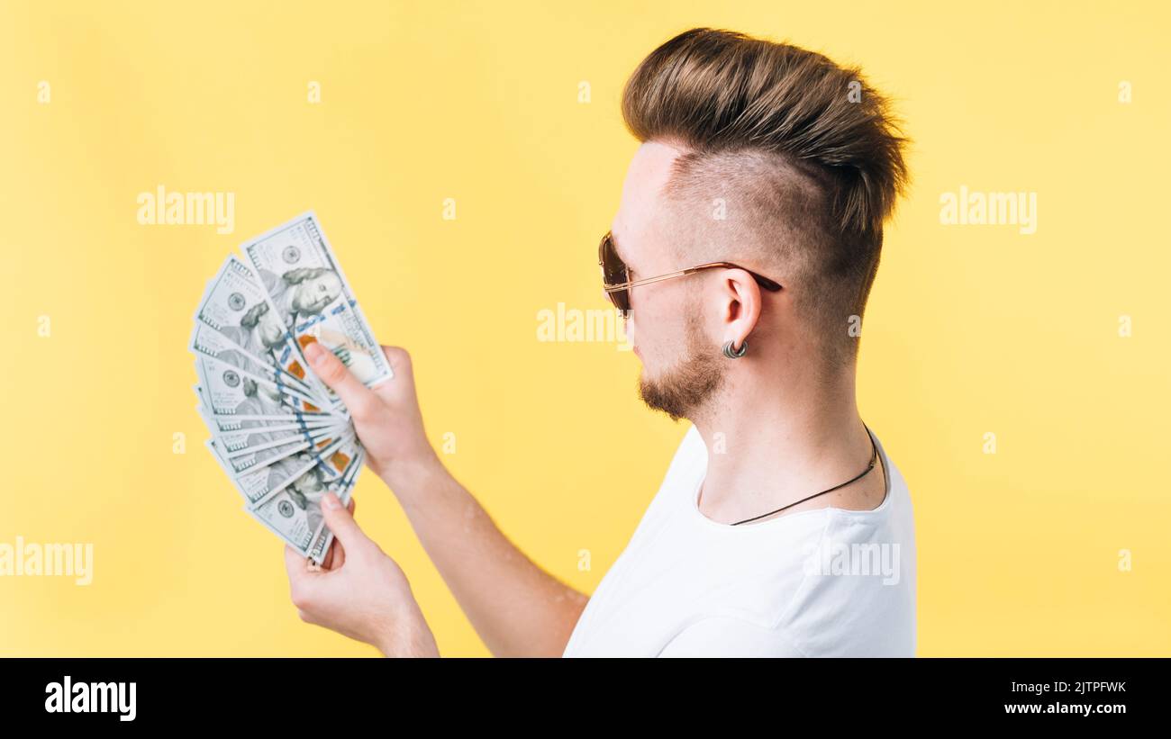 successful rich hipster guy portrait money fan Stock Photo