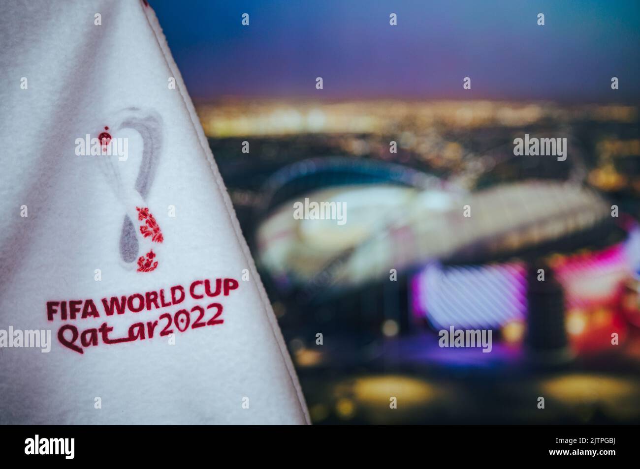 DOHA, QATAR, AUGUST 30, 2022: Fifa world Cup 2022 in Qatar. Football World Championship official logo on white blanket.Soccer Khalifa International St Stock Photo