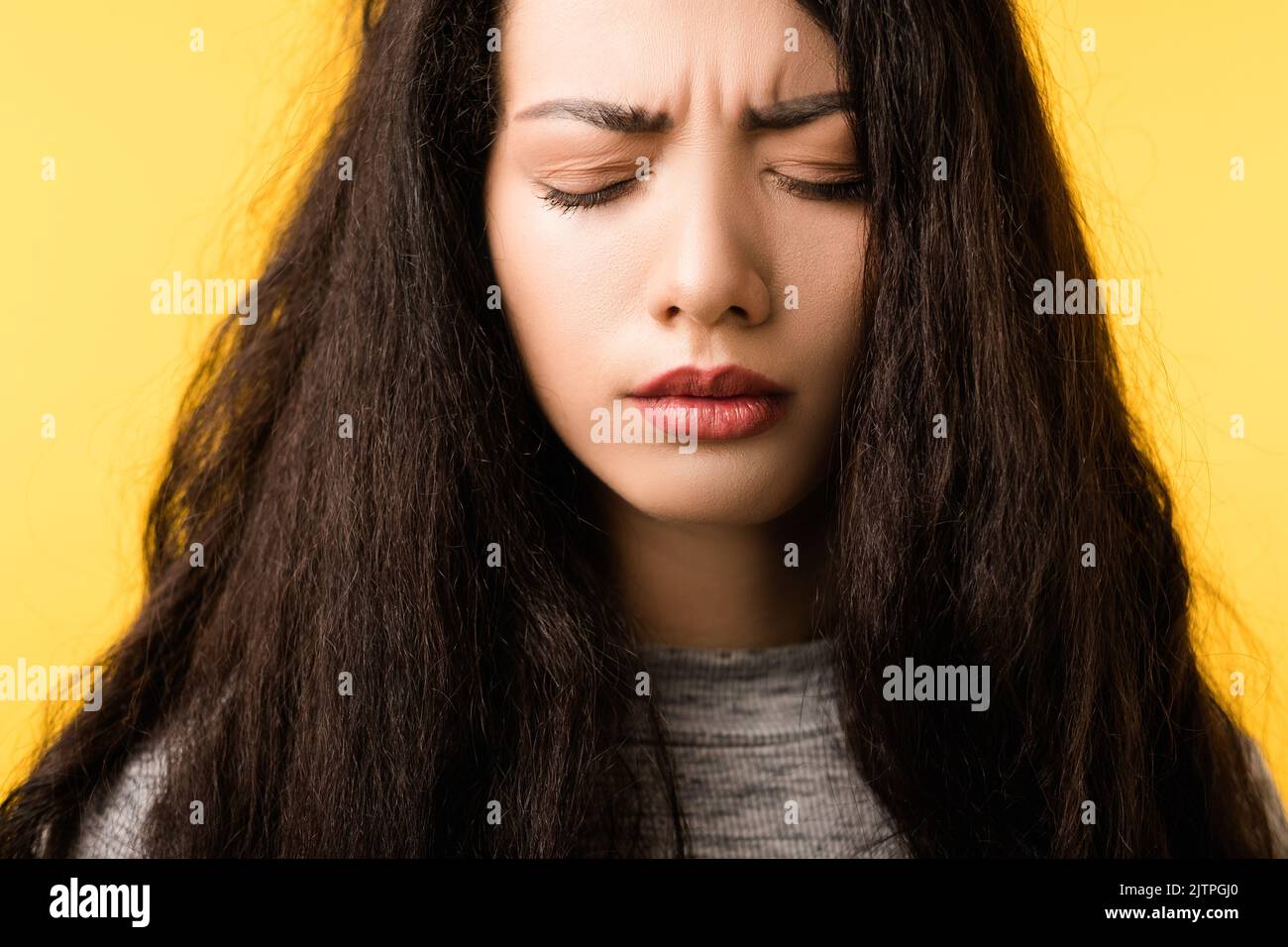 woman face frowning pain headache strain problem Stock Photo Alamy