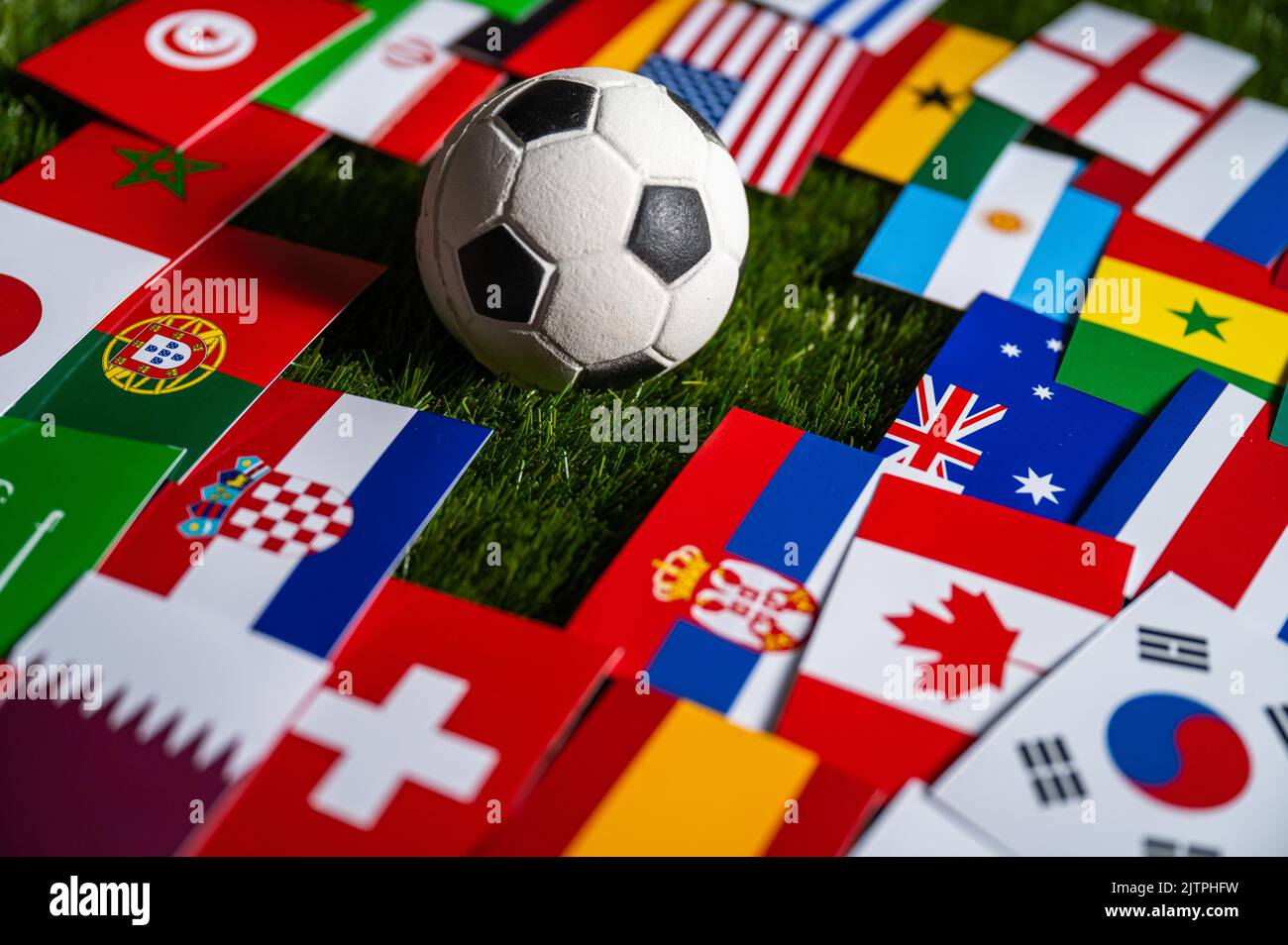 Football Ball and Flags of all 32 Countries which will play in Qatar ...