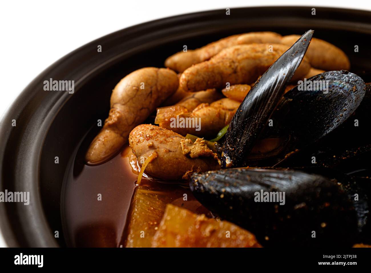 Korean food culture. Food with pollack roe. Spicy soup dish with seafood and vegetables Stock Photo