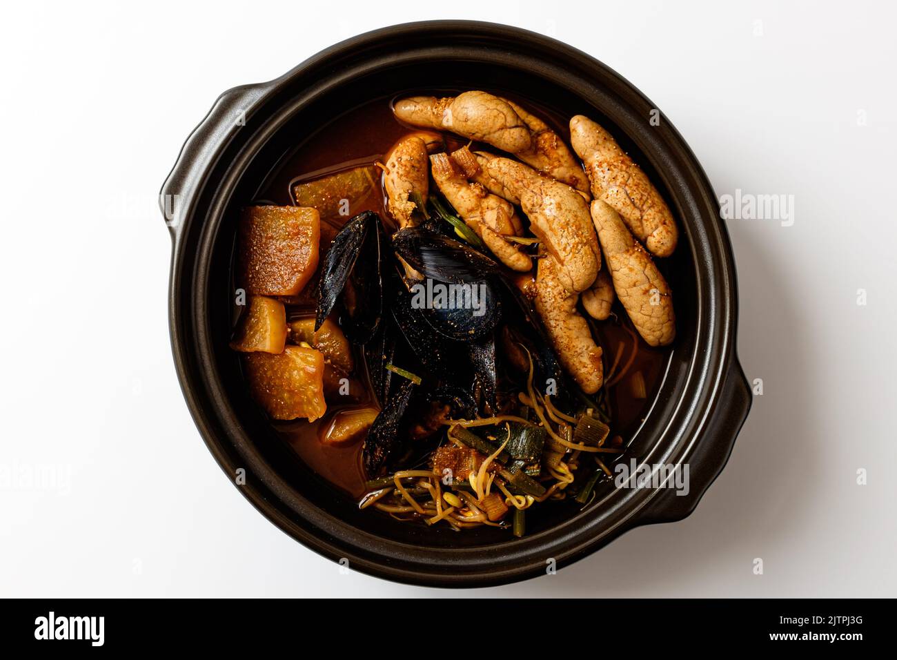Korean food culture. Food with pollack roe. Spicy soup dish with seafood and vegetables Stock Photo