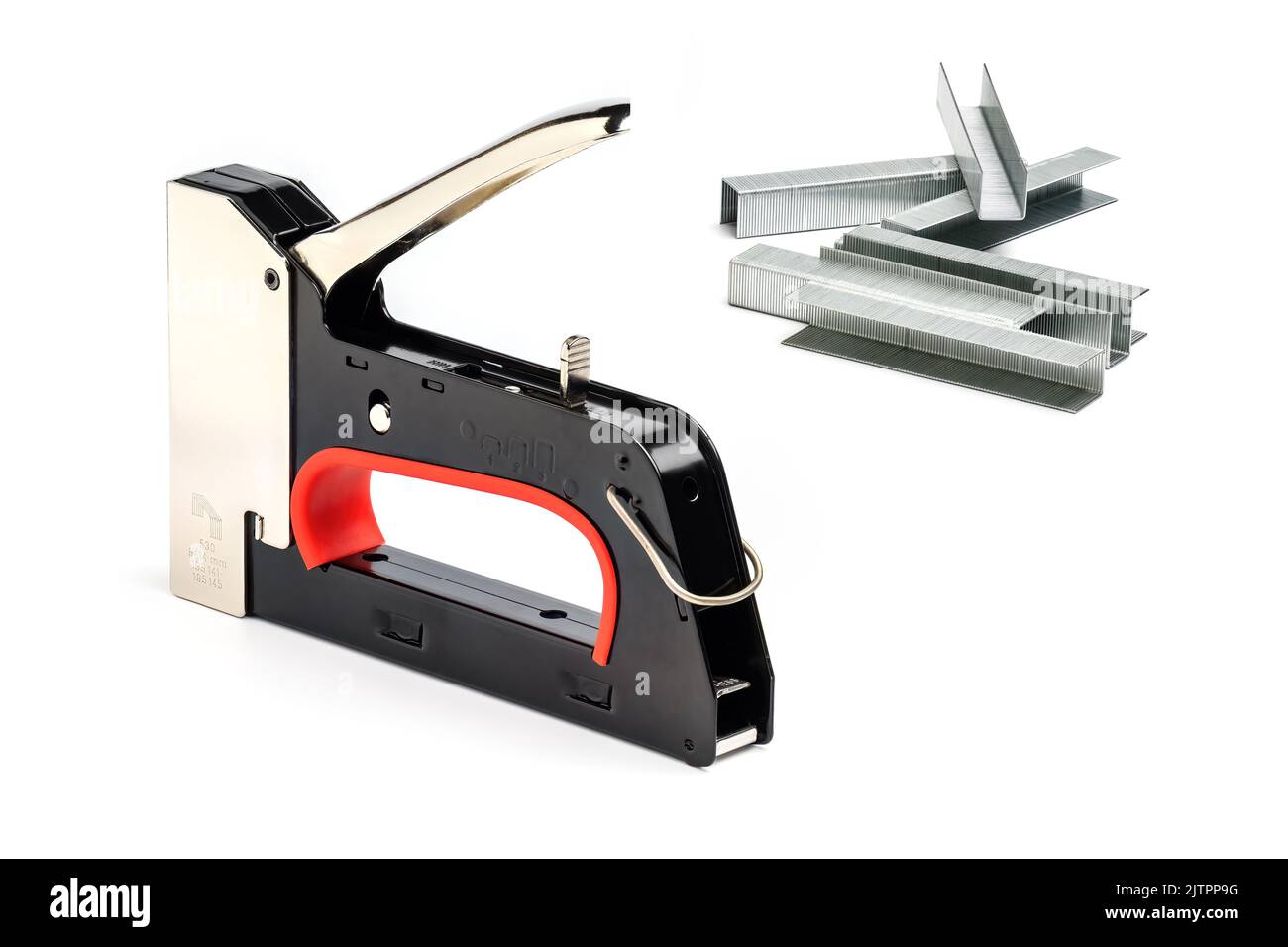 Staple gun with staples isolated on white background. Heavyduty steel