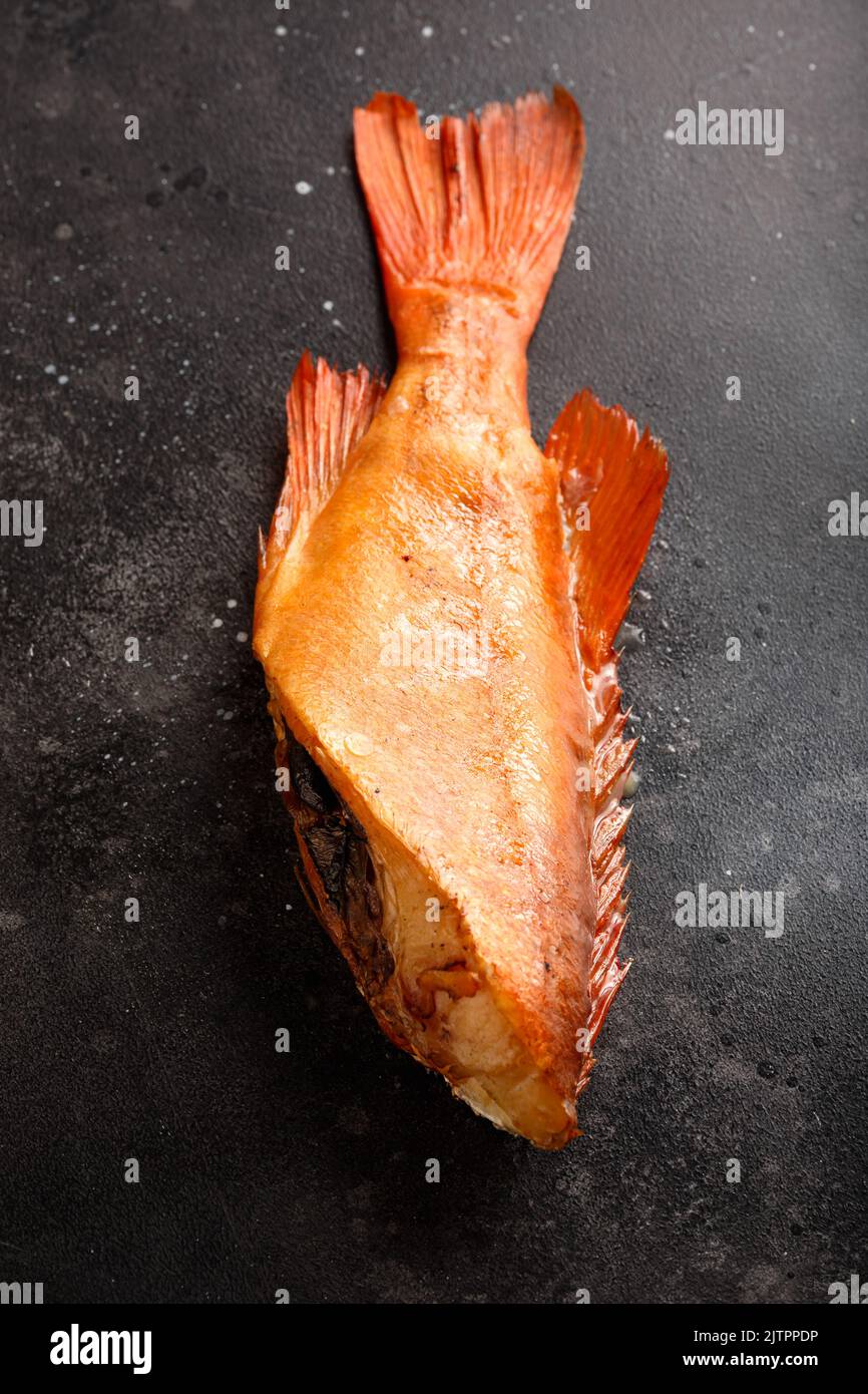 Smoked sea bass, delicate in taste, top view Stock Photo Alamy