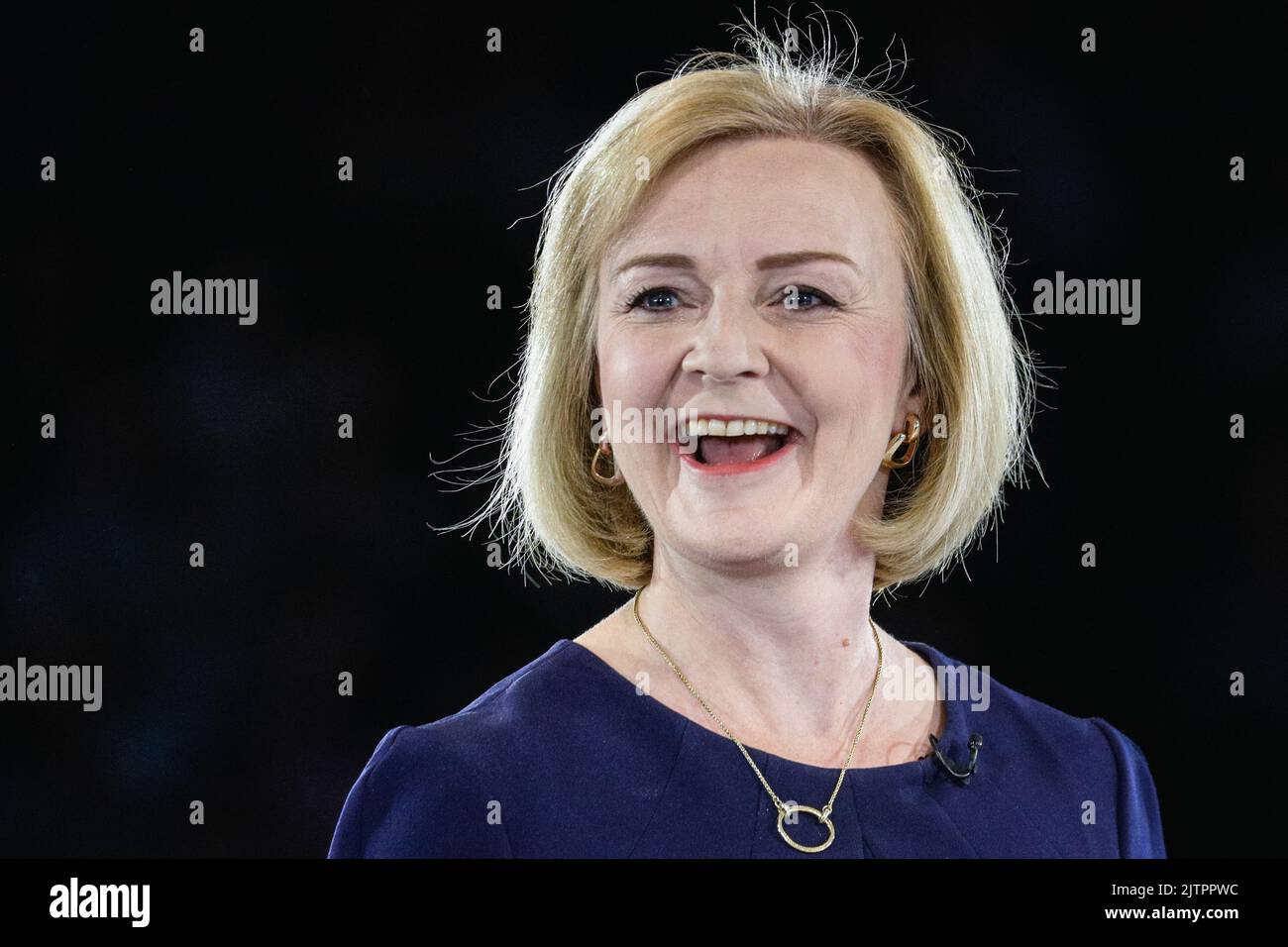 London, UK. 31st Aug, 2022. Liz Truss close up of face, smiling, looks confident. The final hustings in the Conservative Party leadership race, held at Wembley Arena, sees Liz Truss and Rishi Sunak compete to lead the party and become the next Prime Minister. Credit: Imageplotter/Alamy Live News Stock Photo