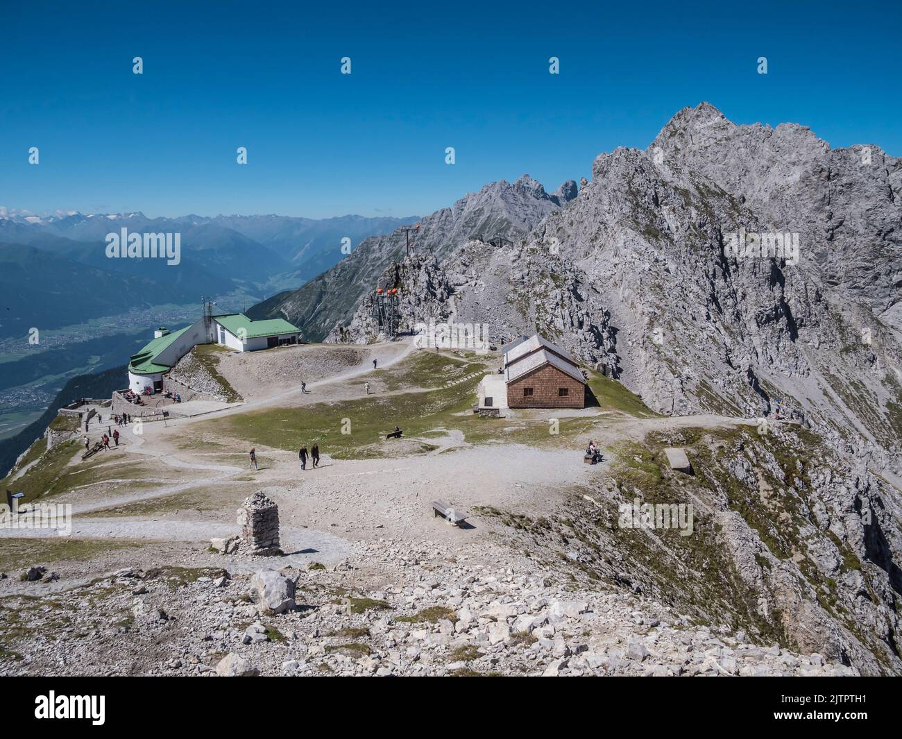 This image is from the Nordkettenbahn and the top of the Hafelekar Spitze for the overview of the city of Innsbruck in the Austrian Tirol Stock Photo