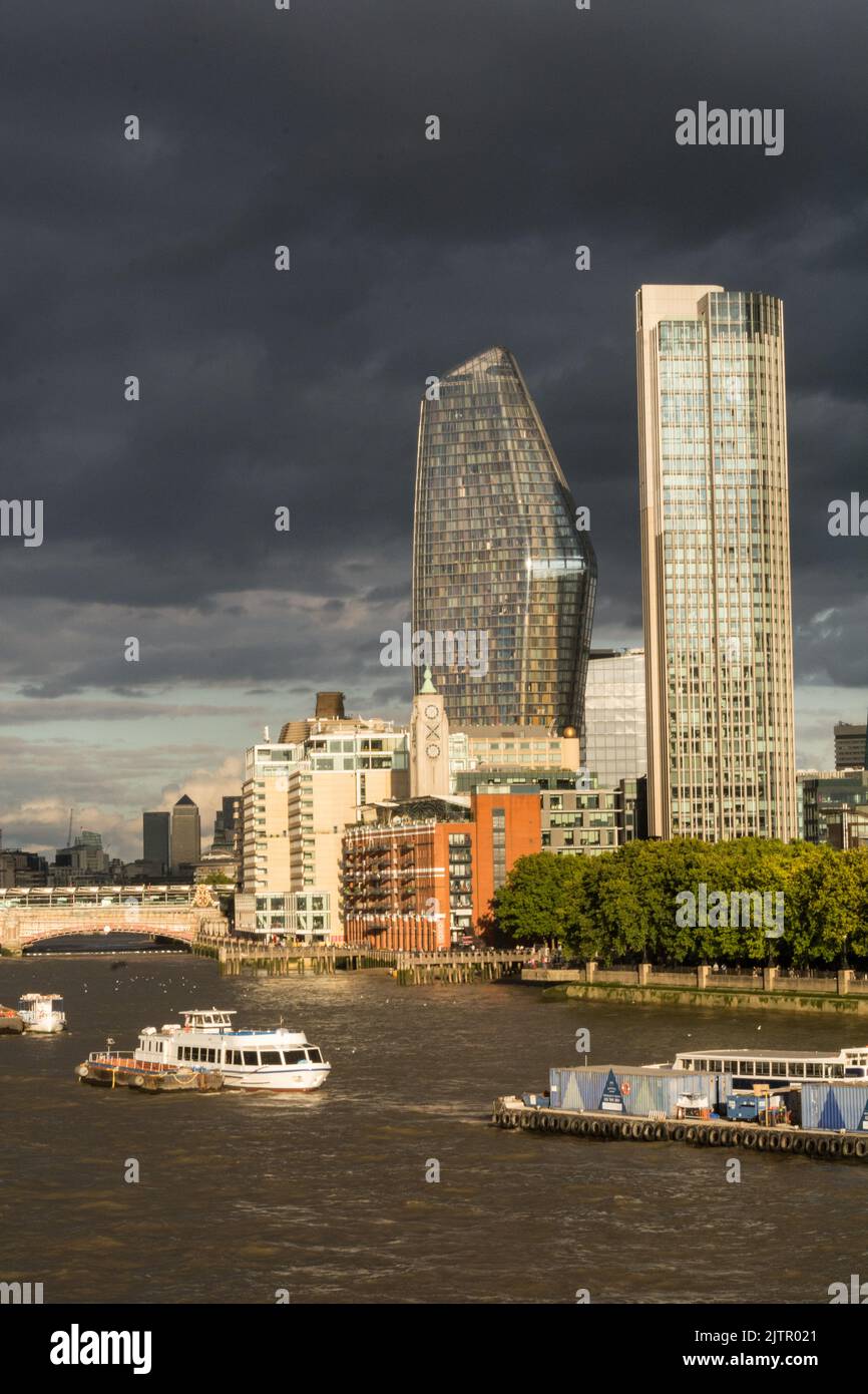 A view of the River Thames and the skyscrapers of the City of London skyline as seen from Waterloo Bridge, London, England, UK Stock Photo
