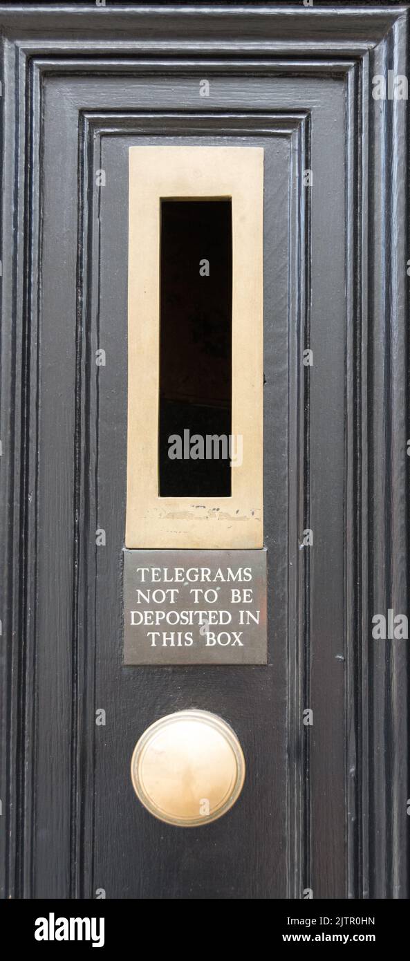 Telegrams not to be deposited in this box sign on a door in Fleet Street, London, England, UK Stock Photo