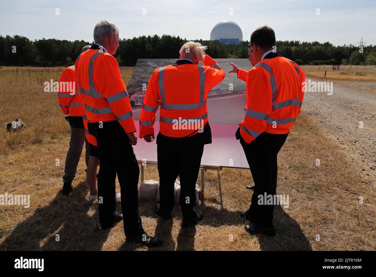 Prime Minister Boris Johnson (centre) looks at plans for the Sizewell C nuclear power station project, during his visit to EDF's Sizewell B Nuclear power station in Suffolk. Picture date: Thursday September 1, 2022. Stock Photo