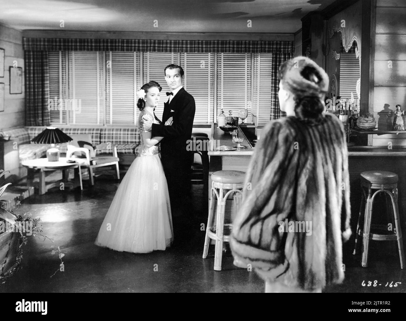 ANN BLYTH ZACHARY SCOTT and JOAN CRAWFORD in MILDRED PIERCE 1945 director MICHAEL CURTIZ novel James M. Cain music Max Steiner producer Jerry Wald Warner Bros. Stock Photo
