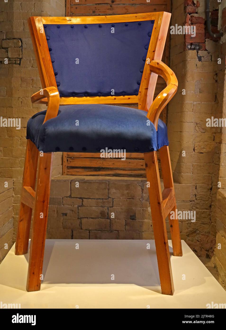 Hockneys oversized blue distorted chair,Salts Mill, Saltaire mill,tribute to 'The Chair' painting 1985 -striking subversion of traditional perspective Stock Photo