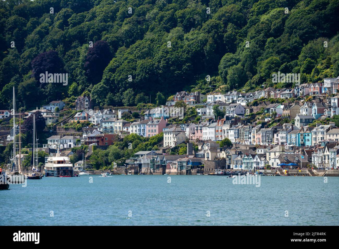 Looking down the River Dart to houses built on the hill in Dartmouth