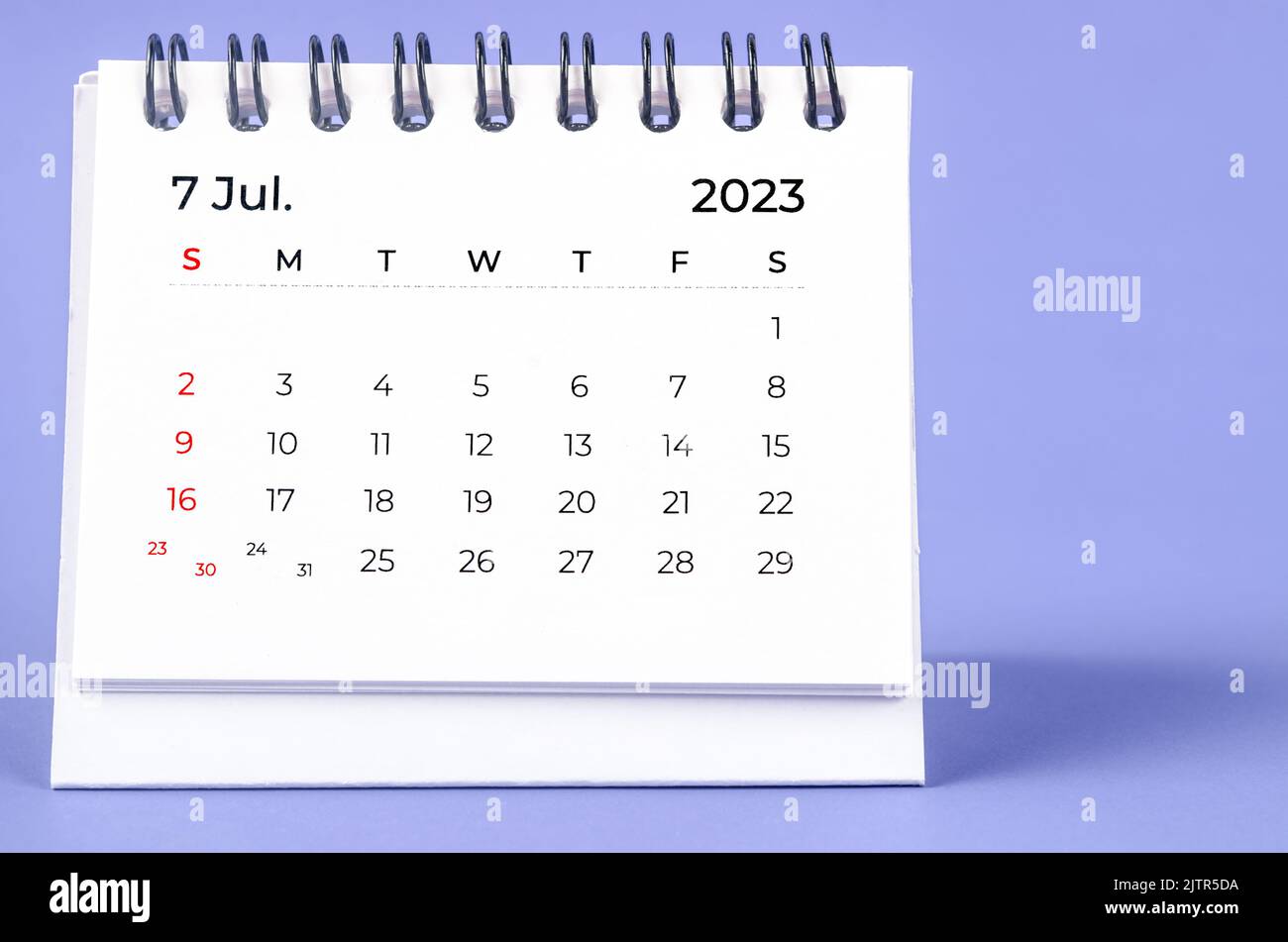 July 2023 Monthly desk calendar for 2023 year on purple background ...