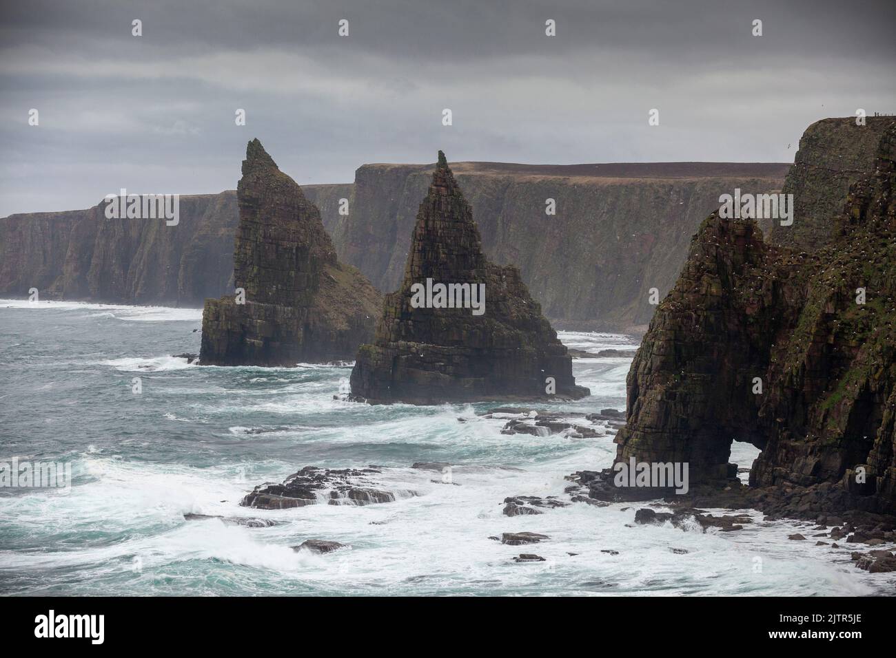The Stacks of Duncansby. Duncansby Sea Stacks near John O Groats, Scotland Stock Photo