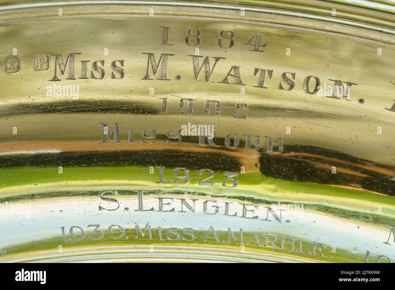 Detail of the first engraving 1884 Miss Watson on the Venus Rosewater Dish and the Wimbledon Ladies' Singles Trophy. Stock Photo