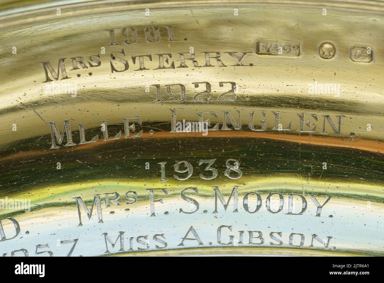 Detail of the engraving 1901 Miss Sterry, 1922 Mlle Lenglen and 1938 Mrs Moody on the Venus Rosewater Dish, the Wimbledon Ladies' Singles Trophy. Stock Photo