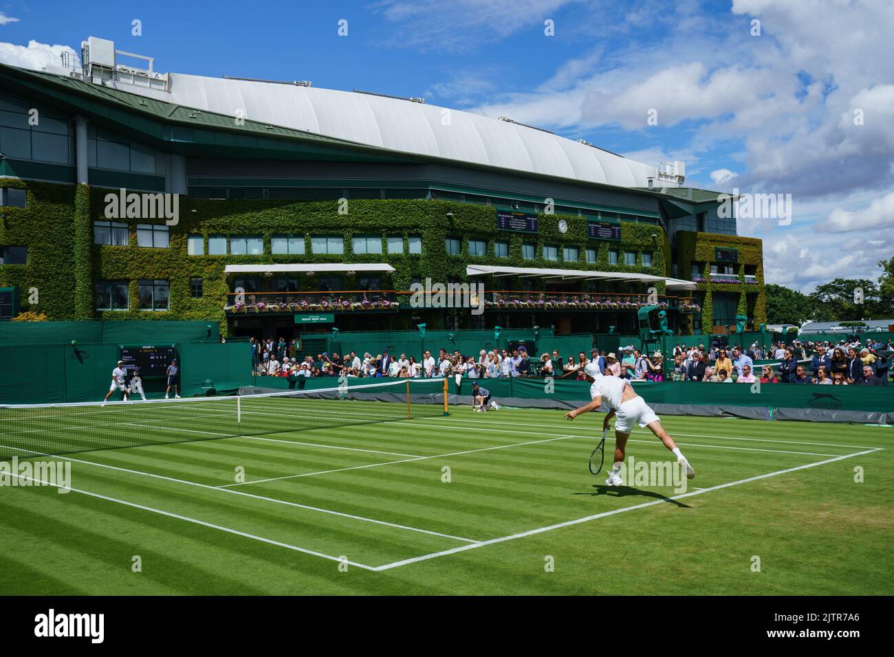 General Views of Tommy Paul and Fernando Verdasco on Court 4 at The Championships 2022. Held at The All England Lawn Tennis Club, Wimbledon. Stock Photo