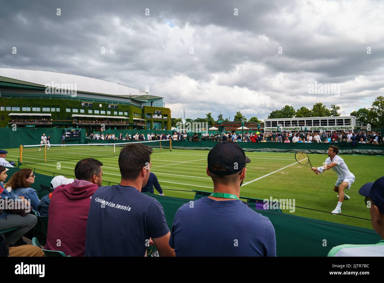 General Views of Maxamillion Marterer and Aljaz Bedene on Court 8 at The Championships 2022. Held at The All England Lawn Tennis Club, Wimbledon. Stock Photo