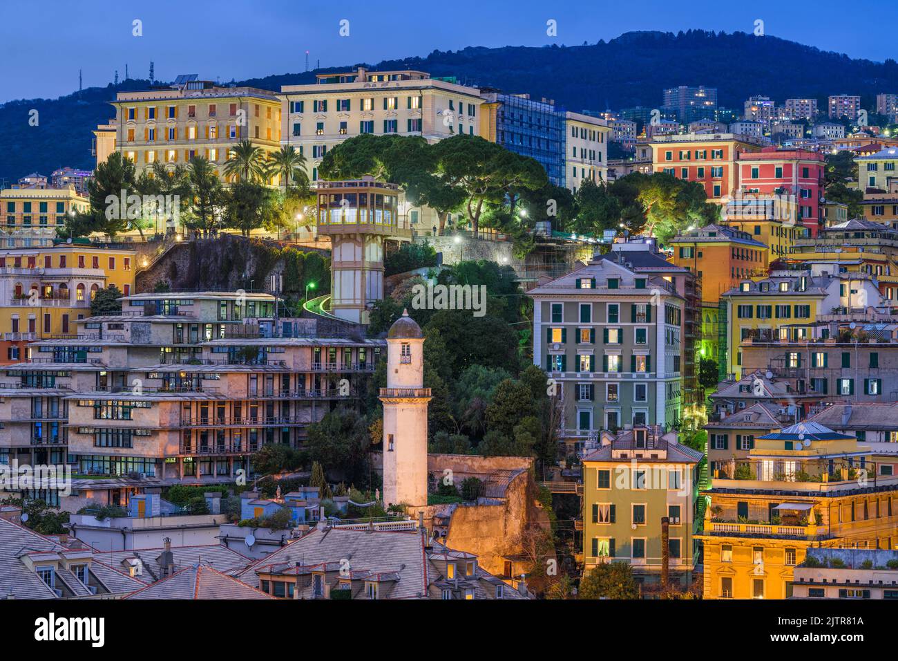 Genova, Italy city skyline view towards the historic belvedere castelletto at twilight. Stock Photo