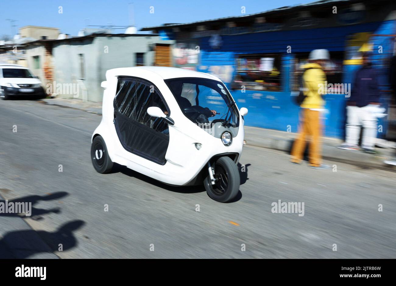 A three-wheel electric scooter is seen driving in Alexandra township, Johannesburg, South Africa, June 7, 2022. Picture taken June 7, 2022. REUTERS/Siphiwe Sibeko Stock Photo