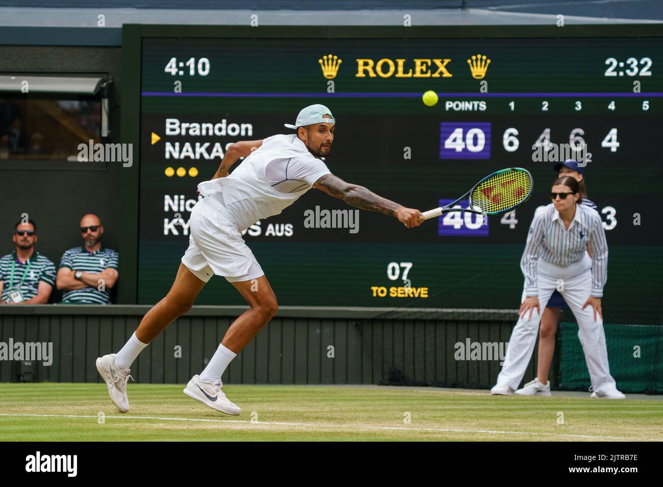 Nick Kyrgios of Australia in action on Centre Court at The Championships 2022. Held at The All England Lawn Tennis Club, Wimbledon. Stock Photo