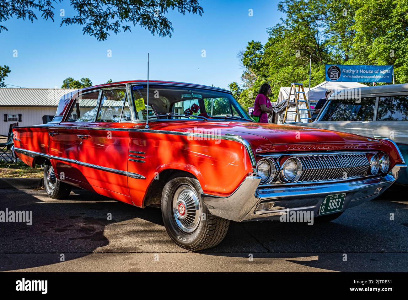 Falcon Heights, MN - June 17, 2022: Low perspective front corner view of a 1964 Mercury Montclair Breezeway Sedan at a local car show. Stock Photo