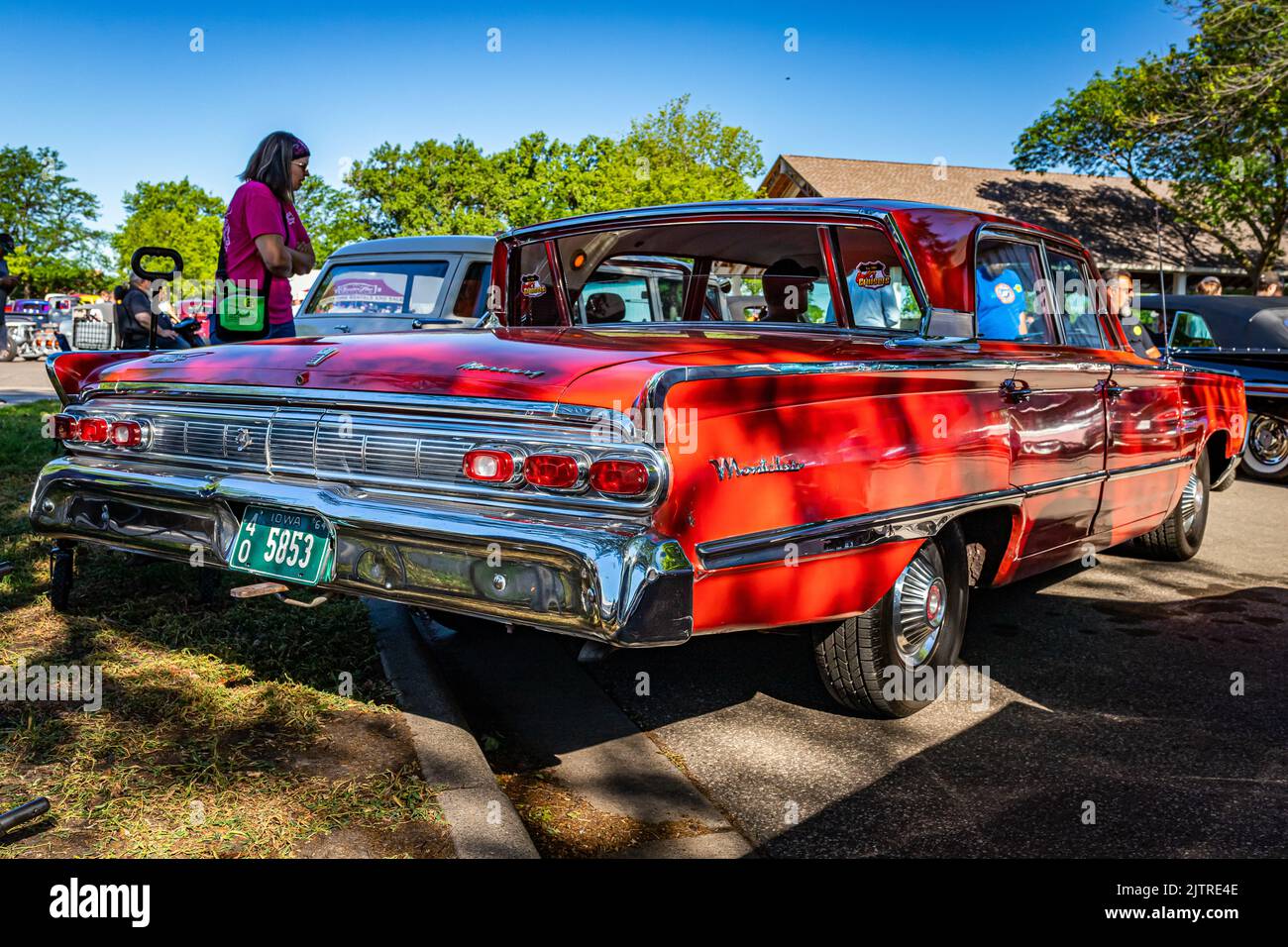 Falcon Heights, MN - June 17, 2022: Low perspective rear corner view of a 1964 Mercury Montclair Breezeway Sedan at a local car show. Stock Photo