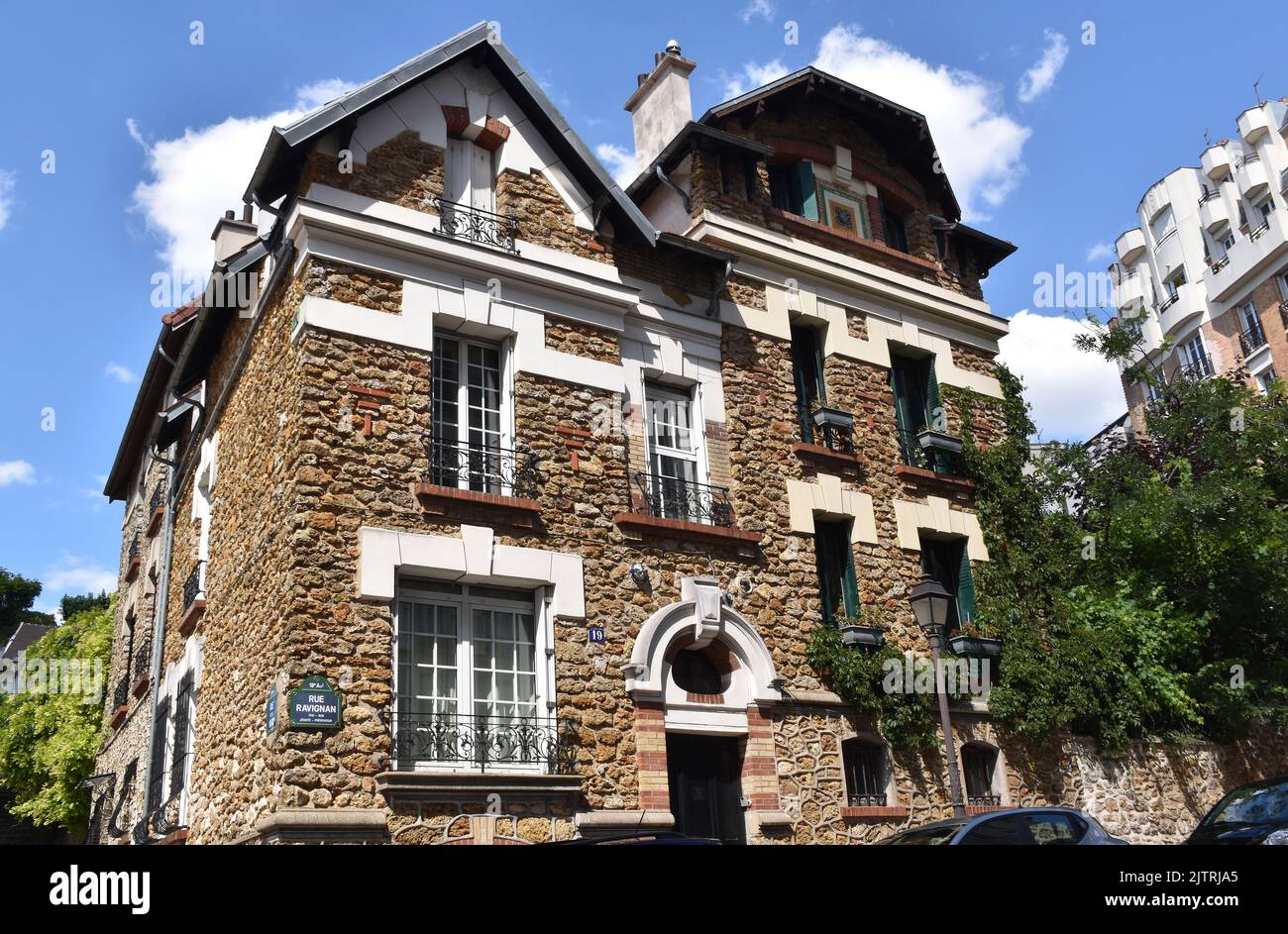 House, or houses, r. Ravignon, Paris, of red-brown rough stone, with ...