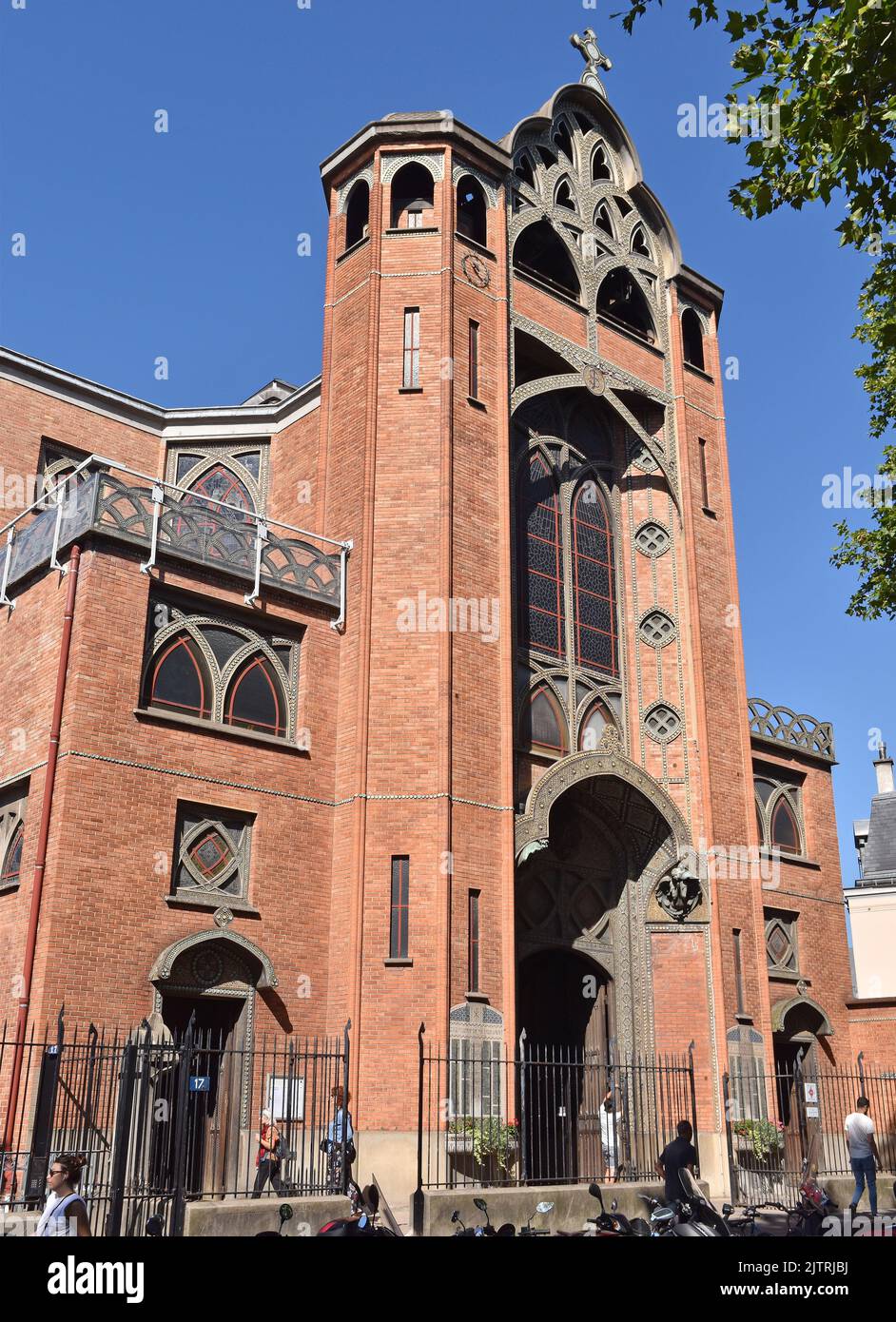 The Church of St Jean de Montmartre, Paris, a very early reinforced concrete church clad externally in red brick, in an eclectic mix of styles. Stock Photo