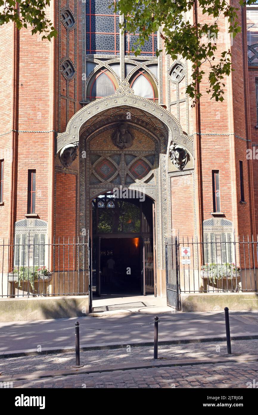 The Church of St Jean de Montmartre, Paris, a very early reinforced concrete church clad externally in red brick, in an eclectic mix of styles. Stock Photo