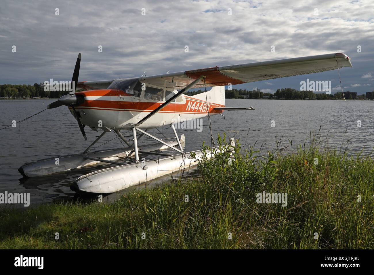 Moored seaplane in a lake of Anchorage, Alaska Stock Photo