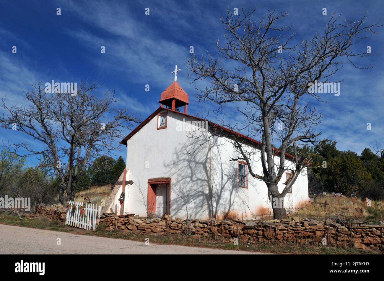 The historic Nuestra Senora de Luz (Our Lady of Light) Catholic church was built in 1880 in Canoncito, New Mexico. Stock Photo