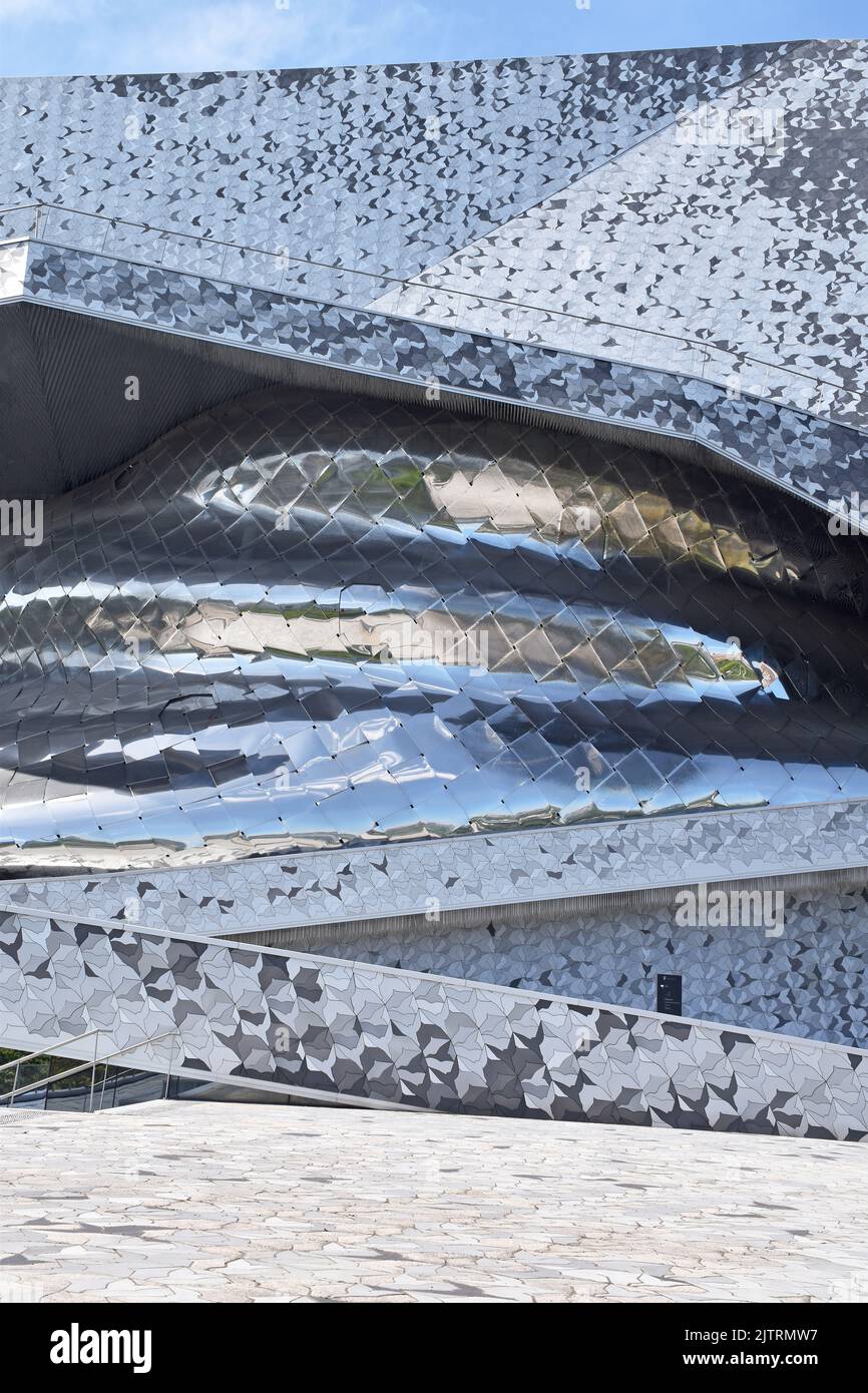 Philharmonie de Paris, a symphony hall & two smaller halls, resembling a small hill, the approach from the east to the Parvis and the main entrance. Stock Photo