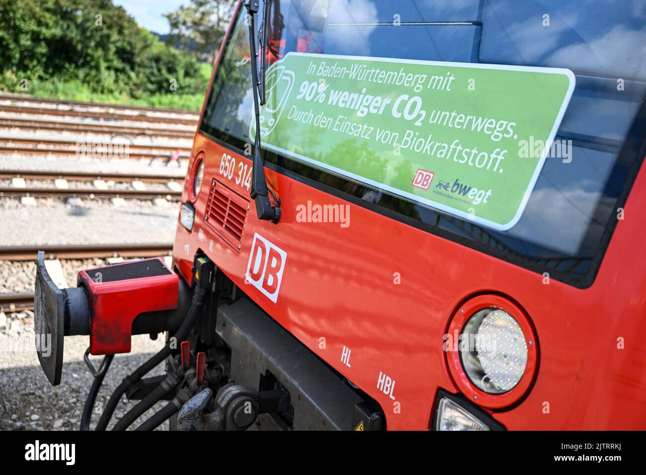 Aulendorf, Germany. 01st Sep, 2022. A sign reading 'On the road in Baden-Württemberg with 90 percent less CO2. Through the use of biofuel.' is affixed behind the windshield of the regional train that will be the first in Germany to be fueled with biofuel. By the end of 2023, 1.3 million liters of biofuel are to flow. The first regional train of the railroad with biofuel is Aulendorf and Oberschwaben on the way. Credit: Felix Kästle/dpa/Alamy Live News Stock Photo