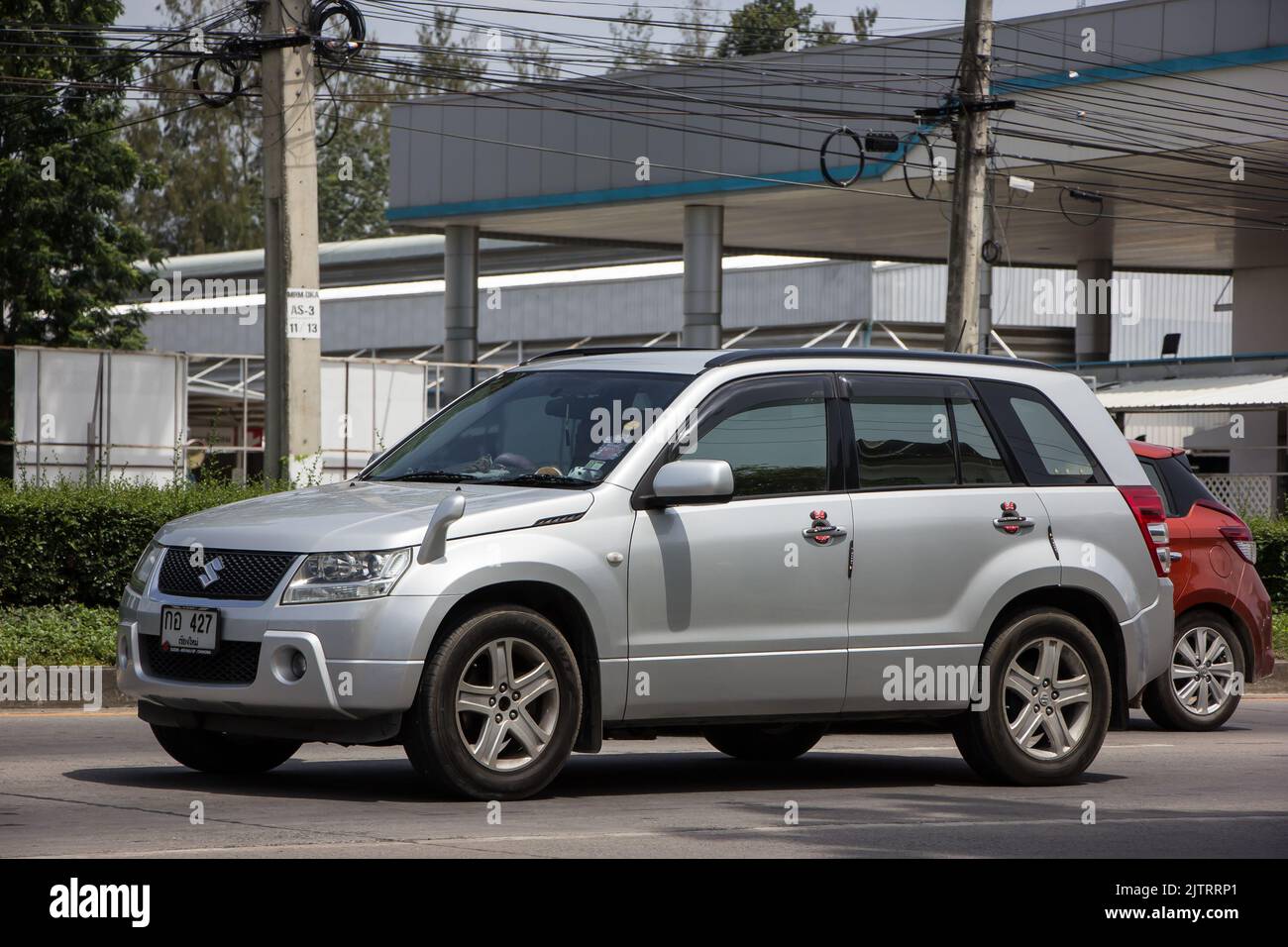 Chiangmai, Thailand -  June  13 2022: Private Mini Suv car, Suzuki Grand Vitara. Photo at road no 121 about 8 km from downtown Chiangmai, thailand. Stock Photo