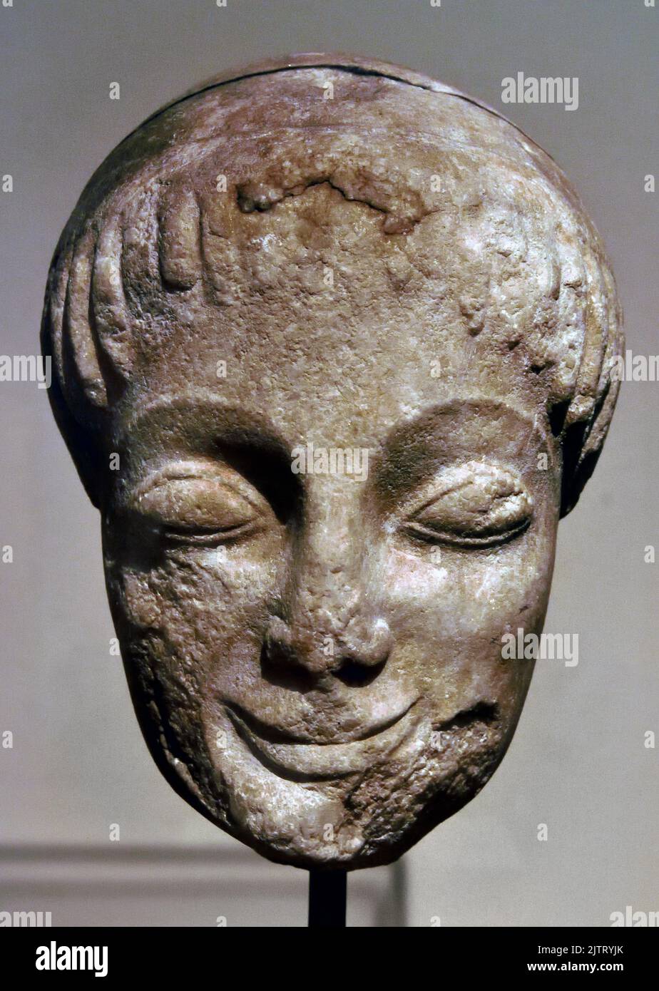 Head of a Kouros, Found sanctuary of Ptoan, Apollo in Boeotia,   National Archaeological Museum in Athens, about 550 BC, Naxian Marble , Stock Photo