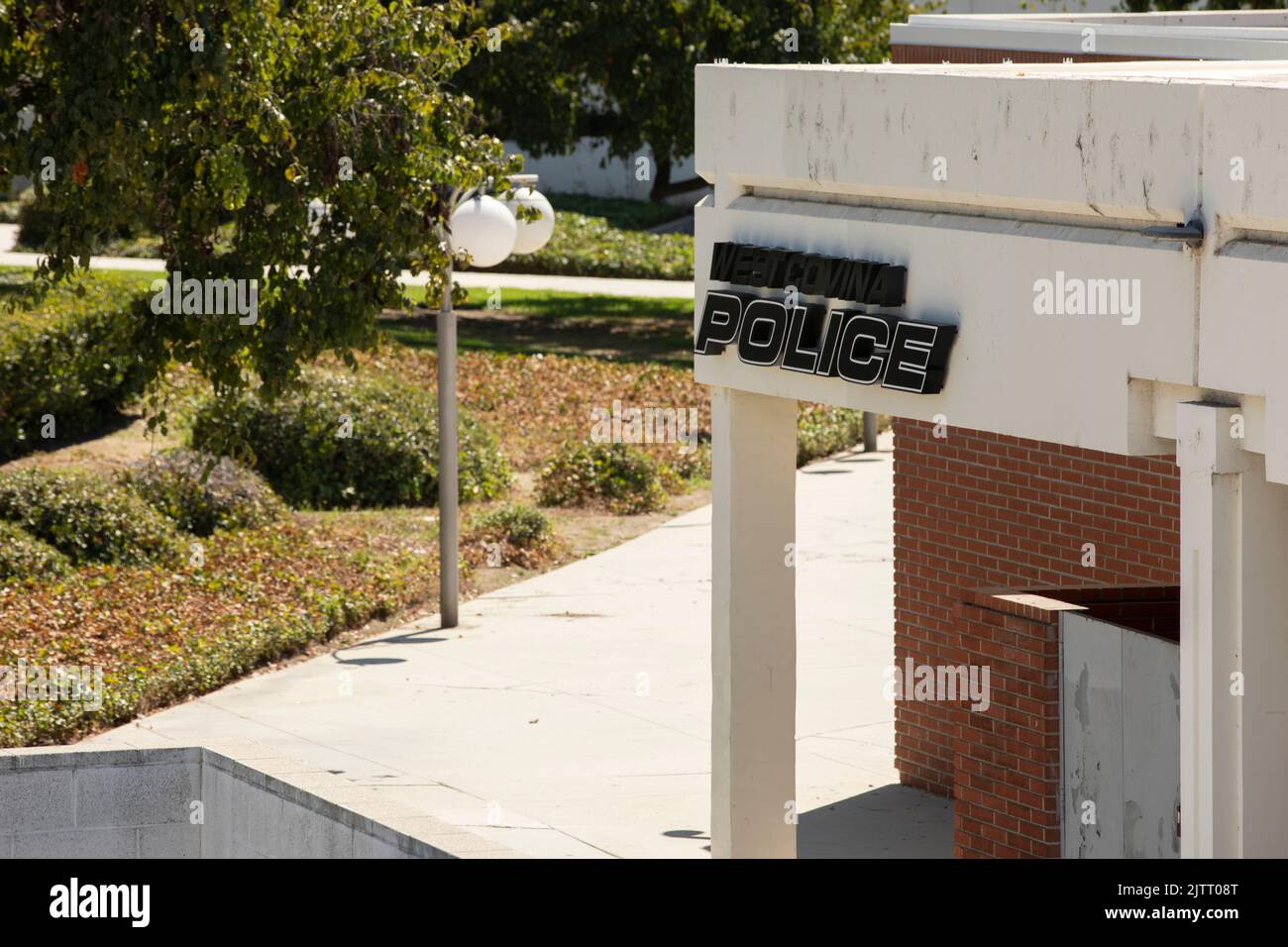 West Covina, California, USA - August 28, 2022: Sunlight shines on the downtown West Covina police station. Stock Photo