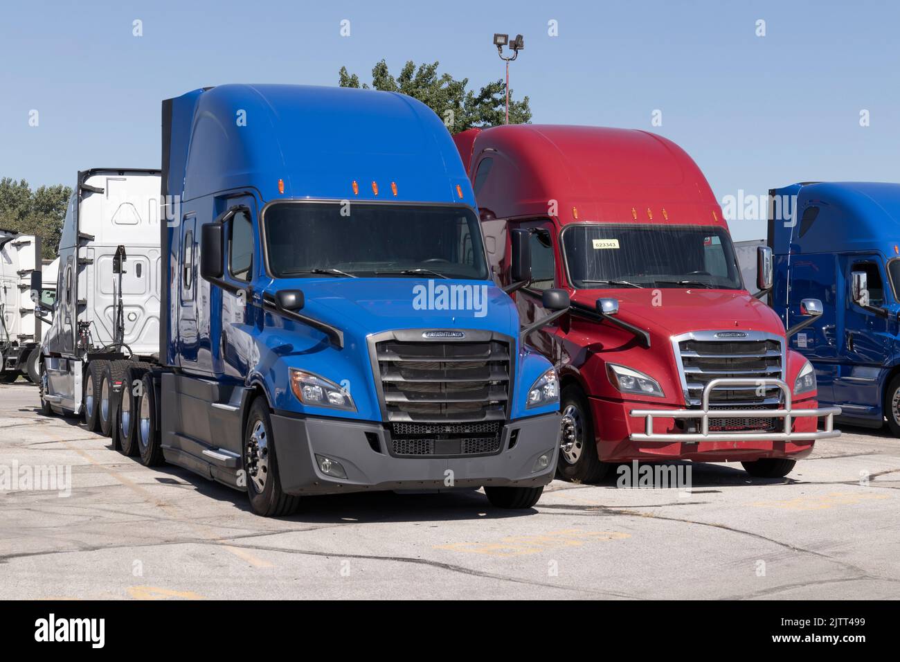 Indianapolis Circa August 2022 Freightliner Big Rig Semi Tractor Trailer Trucks on display at