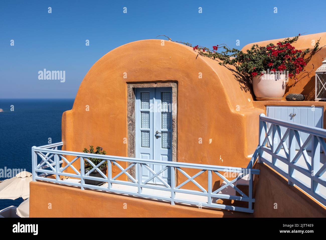 Iconic landmark of the brightly coloured Kastro Oia Houses luxury accommodation in Oia ,Santorini, Greece, Europe Stock Photo