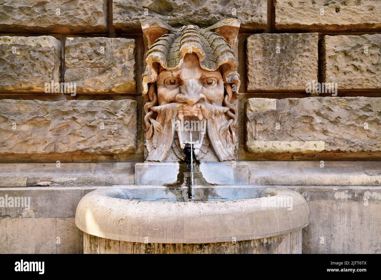 Mannheim, Germany - September 2022: Water spitting gargoyle head at Water Tour called 'Wasserturm' Stock Photo