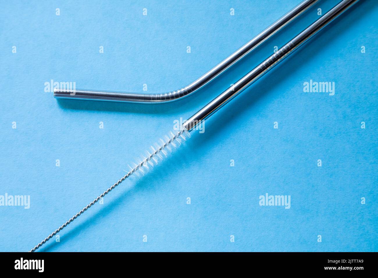 https://c8.alamy.com/comp/2JTT7A9/reusable-stainless-steel-straws-and-cleaning-brush-on-blue-background-eco-friendly-lifestyle-copy-space-top-view-flat-layout-2JTT7A9.jpg