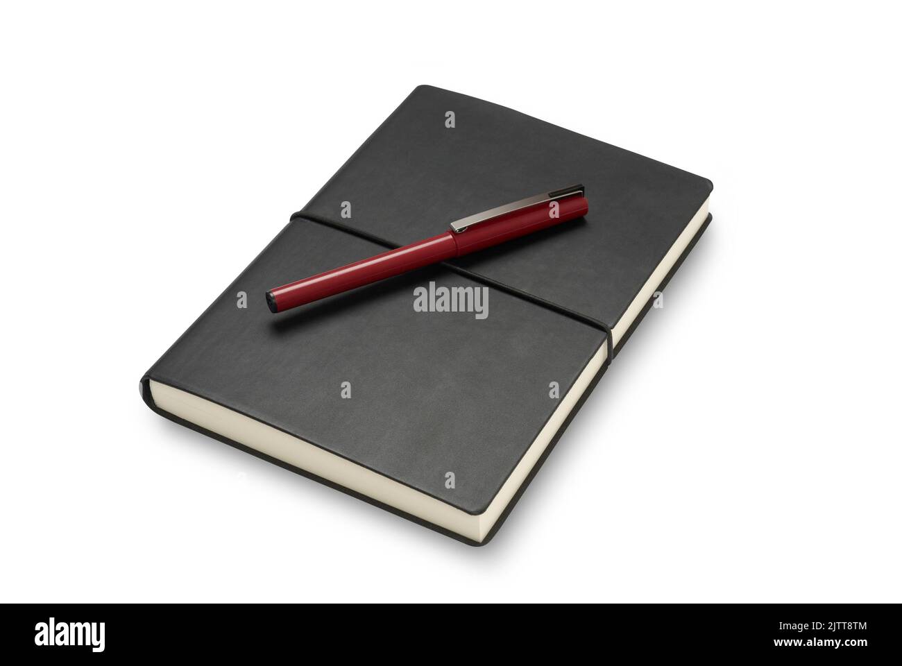 Black journal or notebook closed with a red pen. Isolated on white with ...