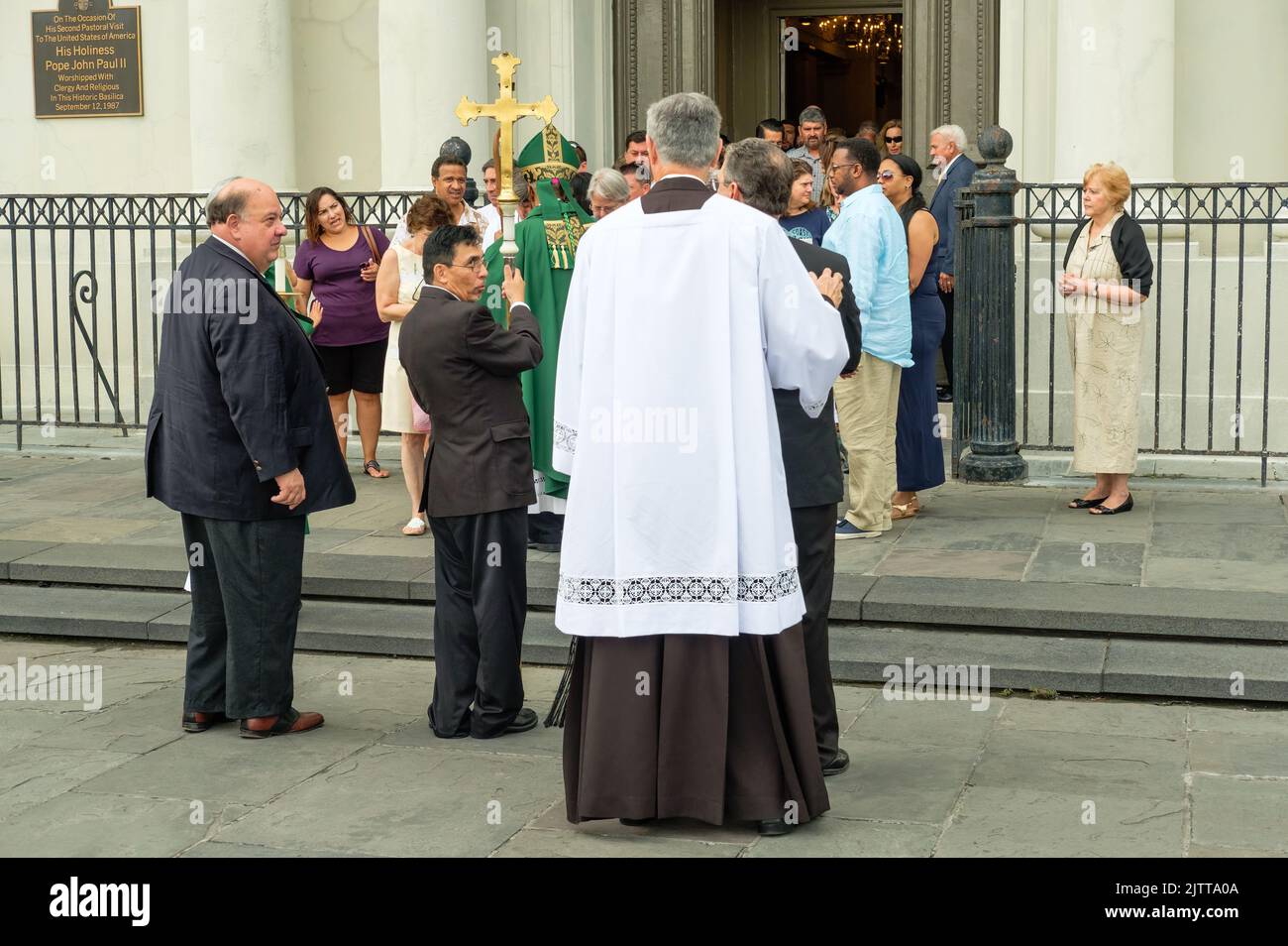 NEW ORLEANS, LA, USA - JULY 16, 2017: Bishop greets parishioners after mass outside St. Louis Cathedral in the French Quarter Stock Photo