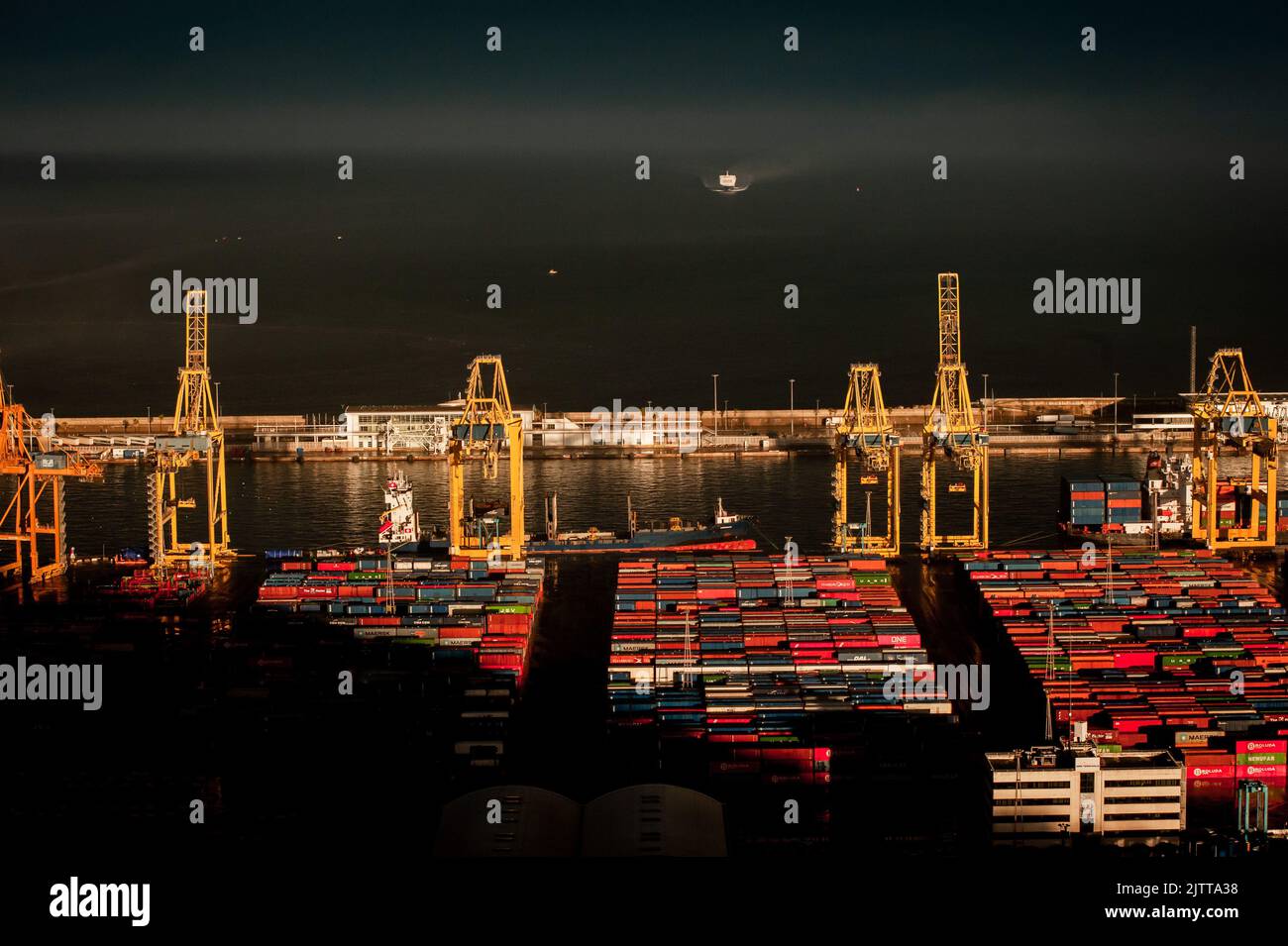 Shipping containers stored in the Port of Barcelona. Stock Photo
