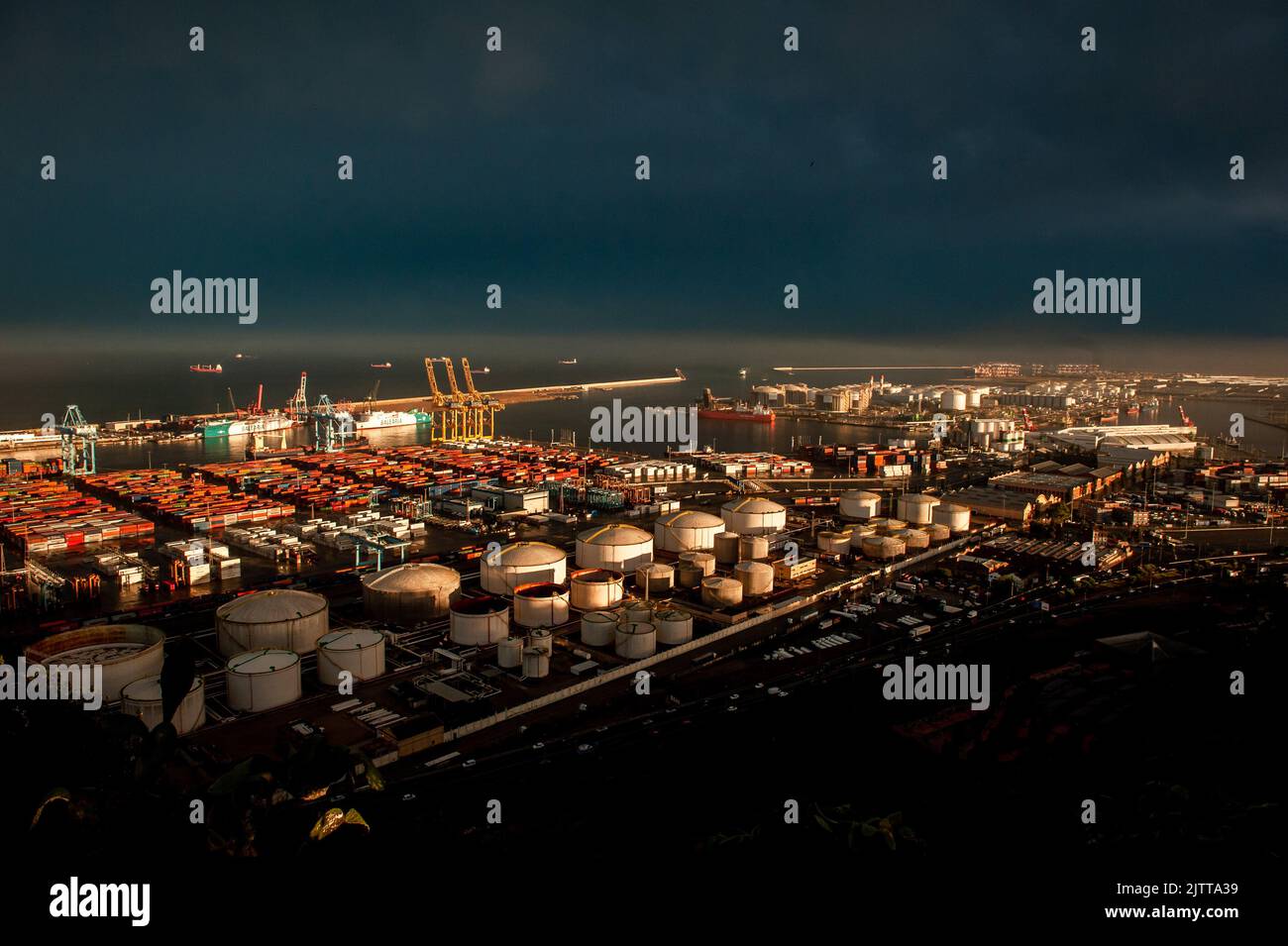 Shipping containers at logistics and industrial area of La Zona Franca in Barcelona port. Stock Photo