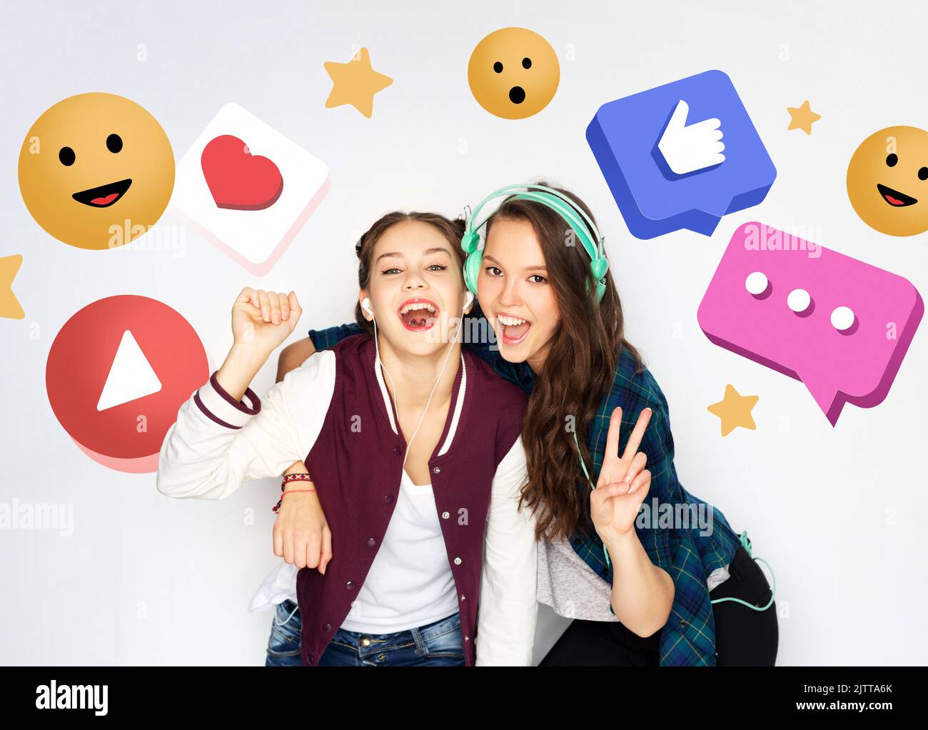 teenage girls with earphones over internet icons Stock Photo - Alamy