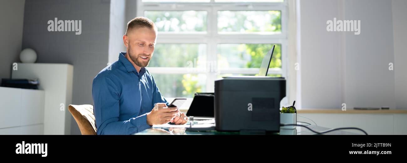 Wireless Print On Printer Using Mobile Phone Stock Photo