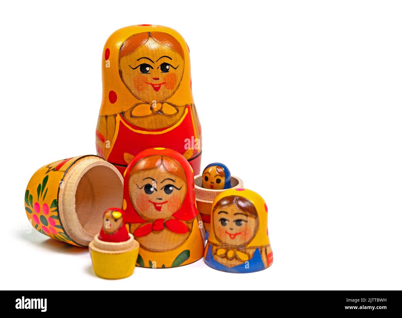 Matryoshka, hand-painted wooden dolls against a white background Stock Photo
