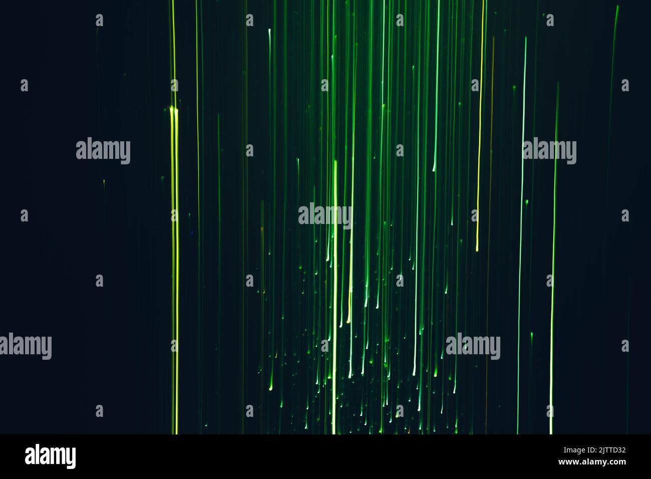 blur neon green lights lines falling sparkles Stock Photo